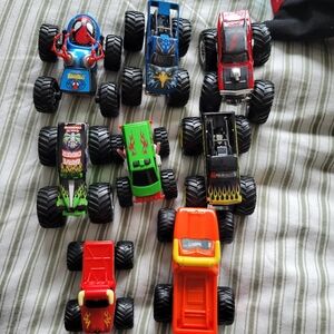 Toy monster trucks assorted lot of 8/Spiderman Missing Parts
